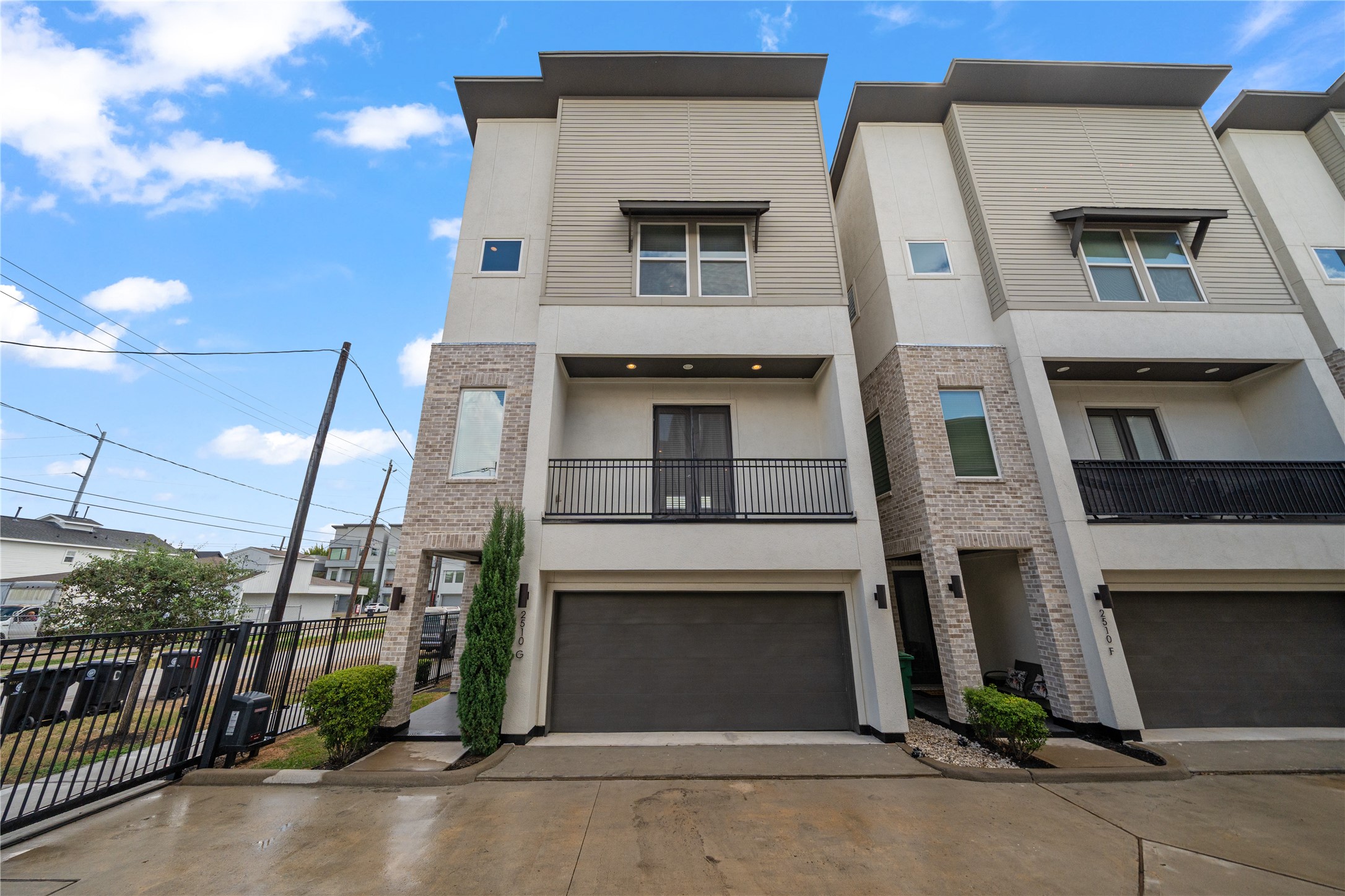 2510 Tuam Street, Unit G Houston, TX 77004 - Photo 3 of 40 a front view of a house with garage