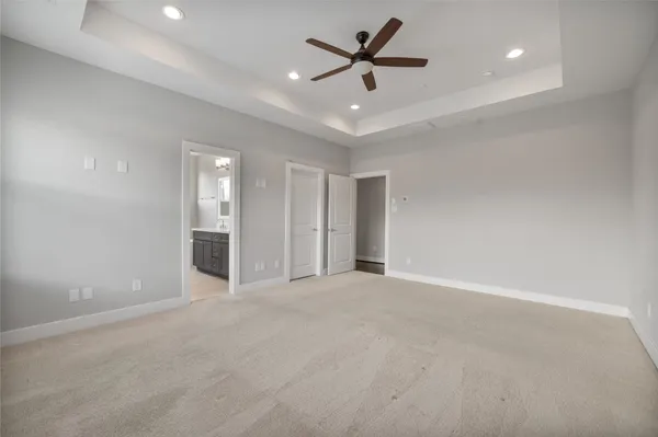 a bathroom with a bathtub a shower a sink and mirror