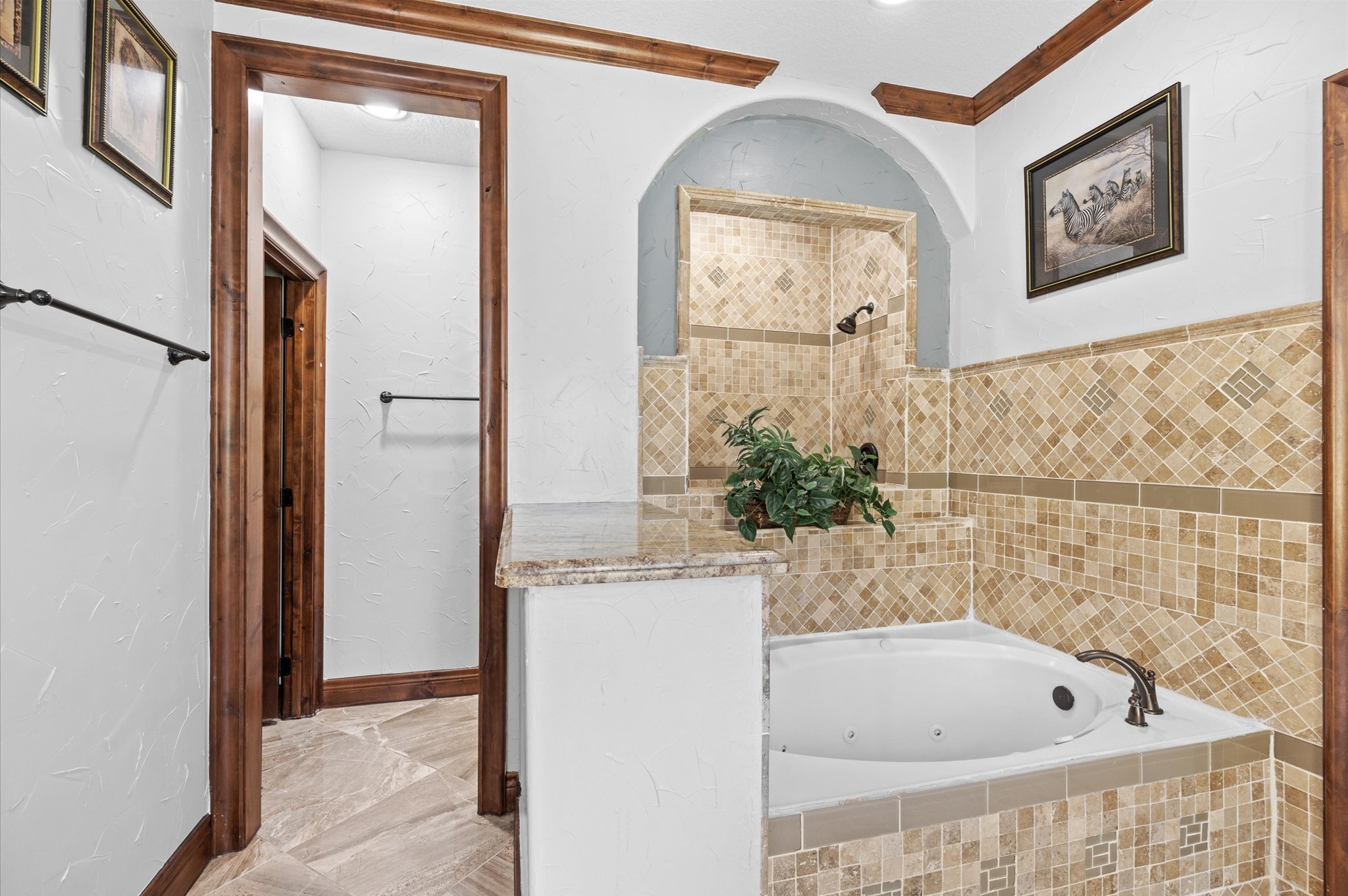 826 Oak Bend Loop Cleveland, TX 77328 - Photo 18 of 50 a bathroom with a bathtub and a shower
