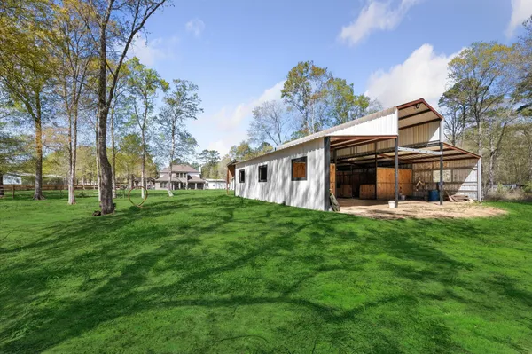 $825,000 | 826 Oak Bend Loop, Cleveland, TX 77328