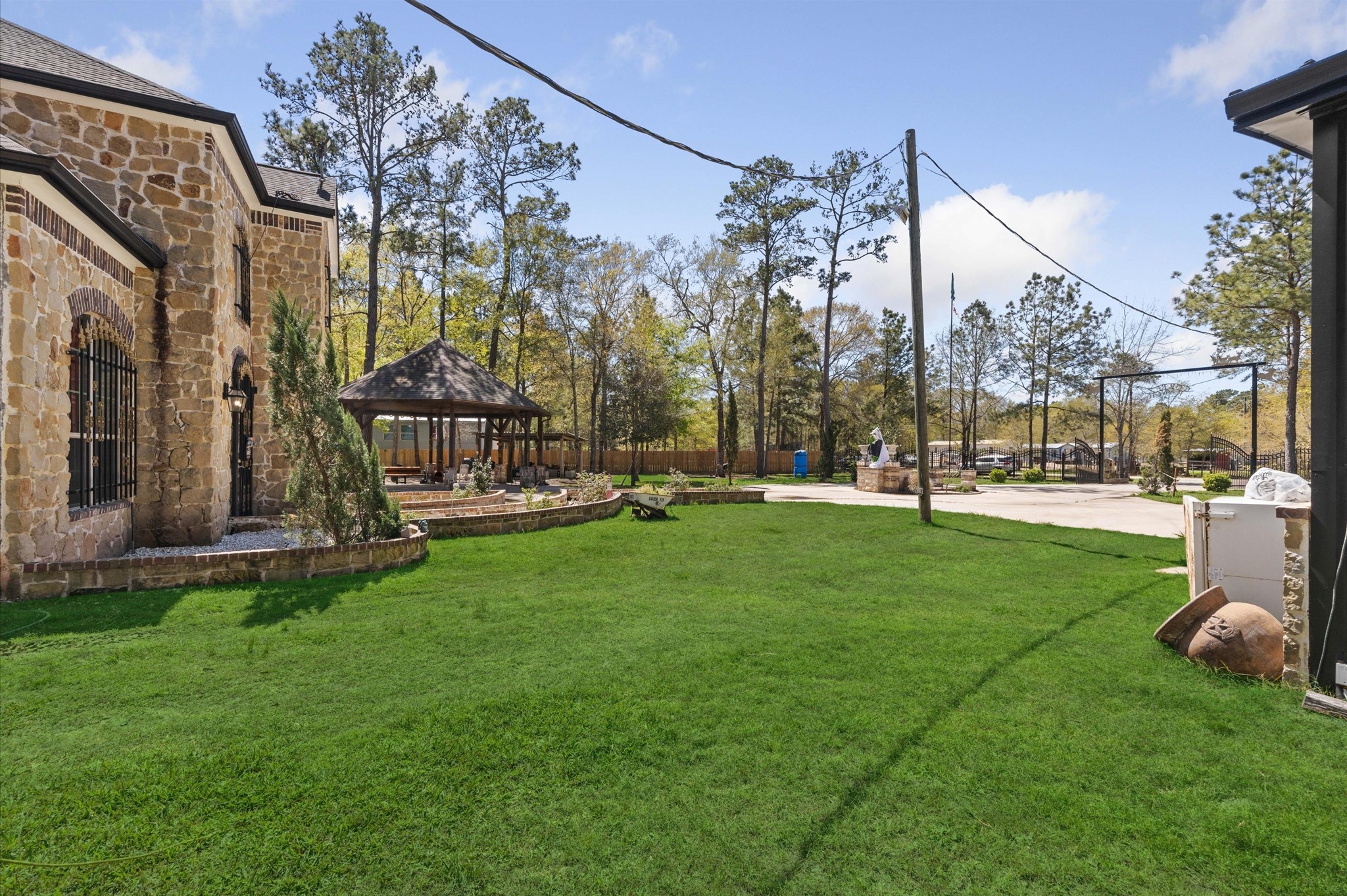 826 Oak Bend Loop Cleveland, TX 77328 - Photo 39 of 50 a view of a park with swings and slides