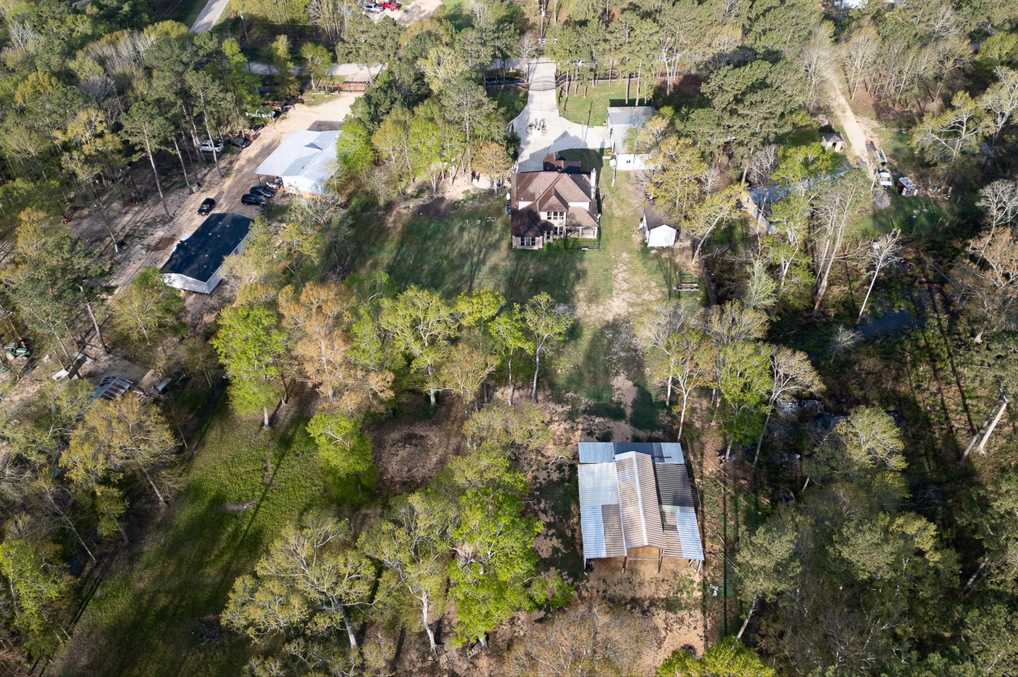 826 Oak Bend Loop Cleveland, TX 77328 - Photo 40 of 50 an aerial view of residential house with outdoor space and trees