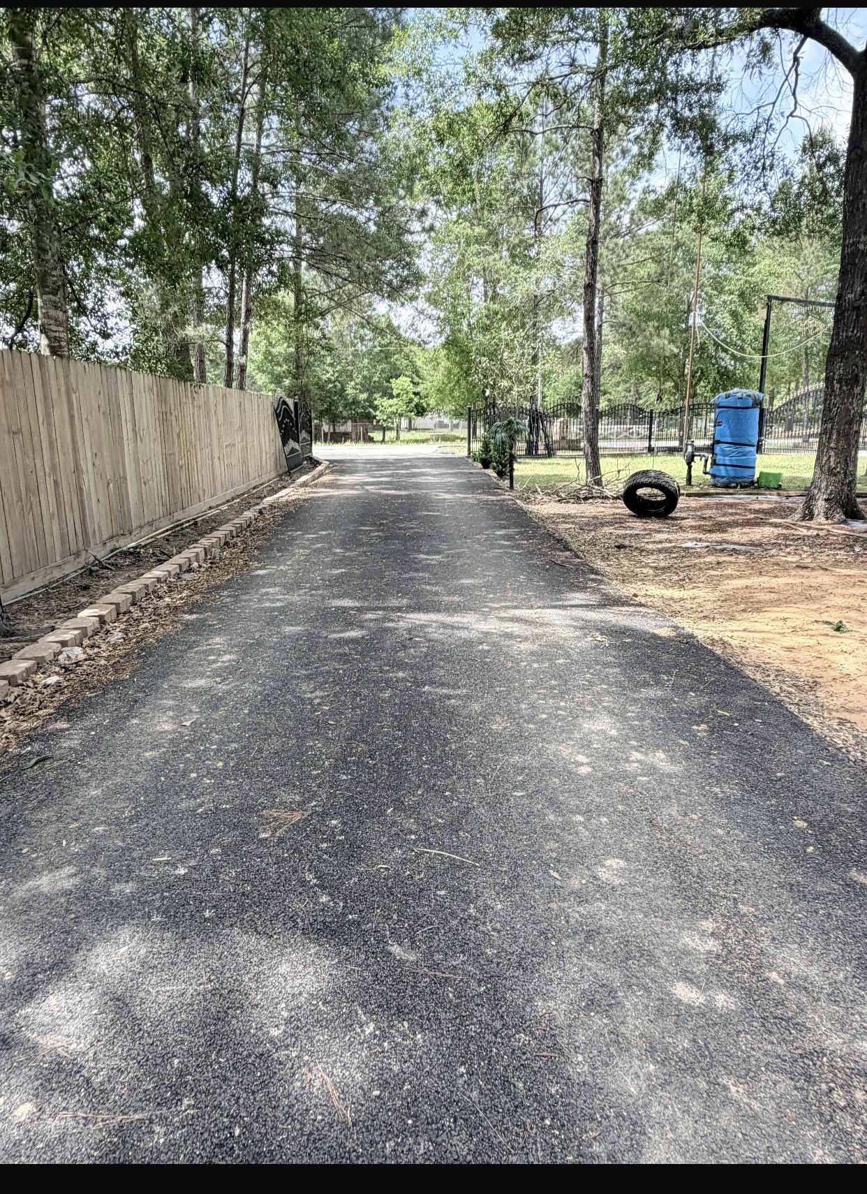 826 Oak Bend Loop Cleveland, TX 77328 - Photo 45 of 50 a view of a street with trees and houses