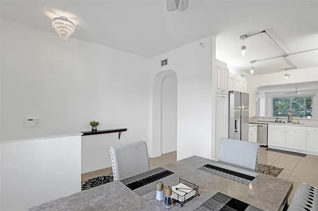 a living room with a couch and a window