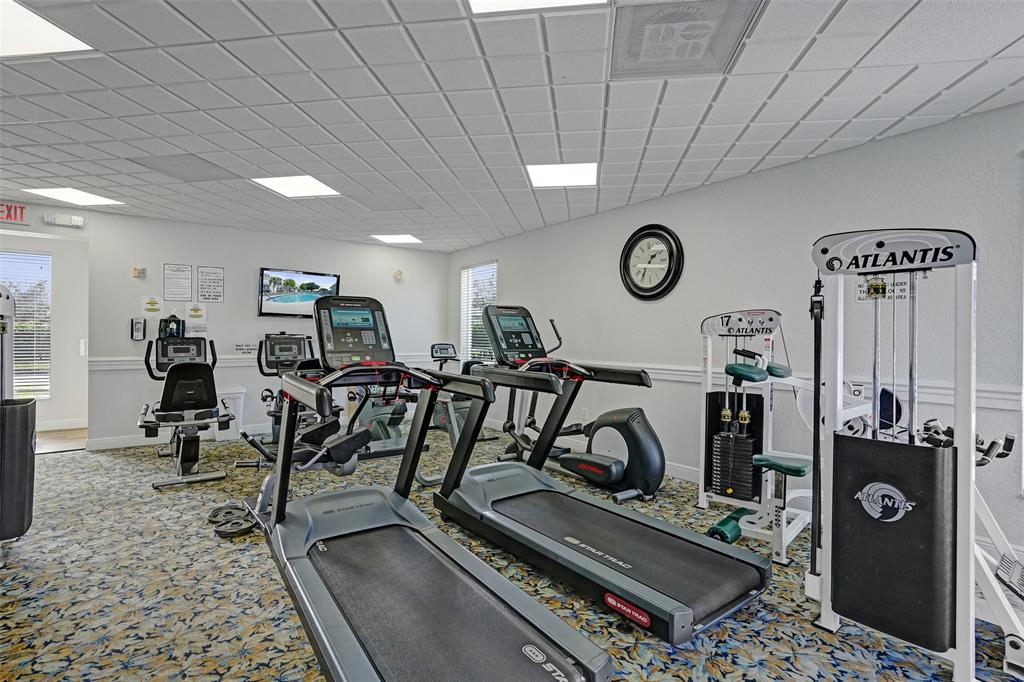 7623 Southampton Terrace, Unit 302 Tamarac, FL 33321 - Photo 41 of 43 a view of a room with gym equipment