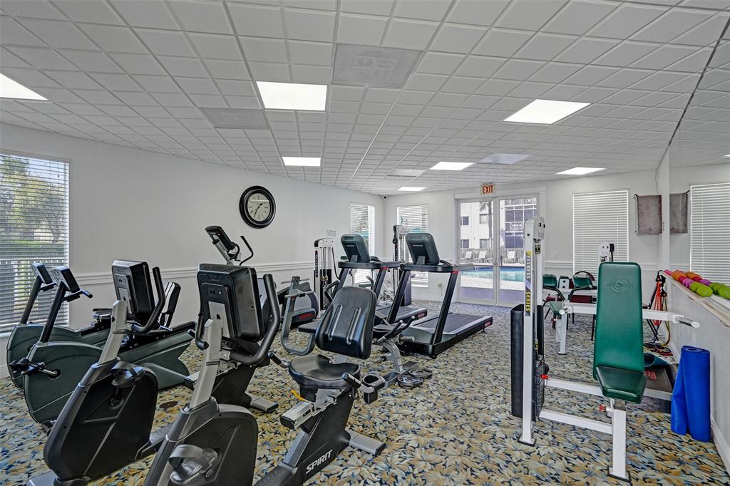 7623 Southampton Terrace, Unit 302 Tamarac, FL 33321 - Photo 42 of 43 a view of a room with gym equipment