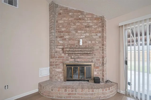 a living room with a fireplace