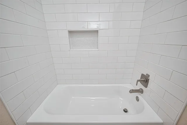 a close up of a bathtub