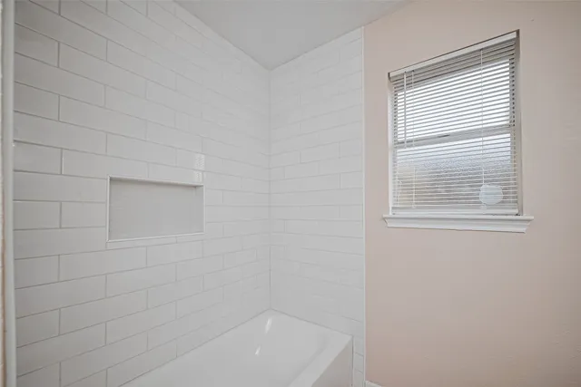 a bathroom with a bathtub