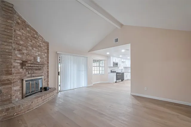 a view of a livingroom with a fireplace