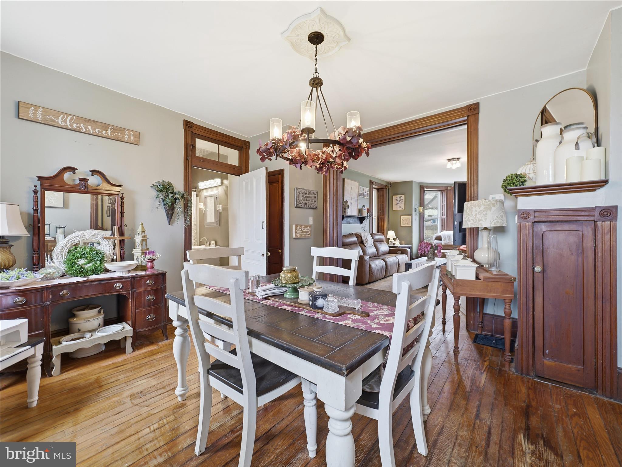 14147 Lower Edgemont Road Waynesboro, PA 17268 - Photo 11 of 45 a view of a dining room with furniture and wooden floor