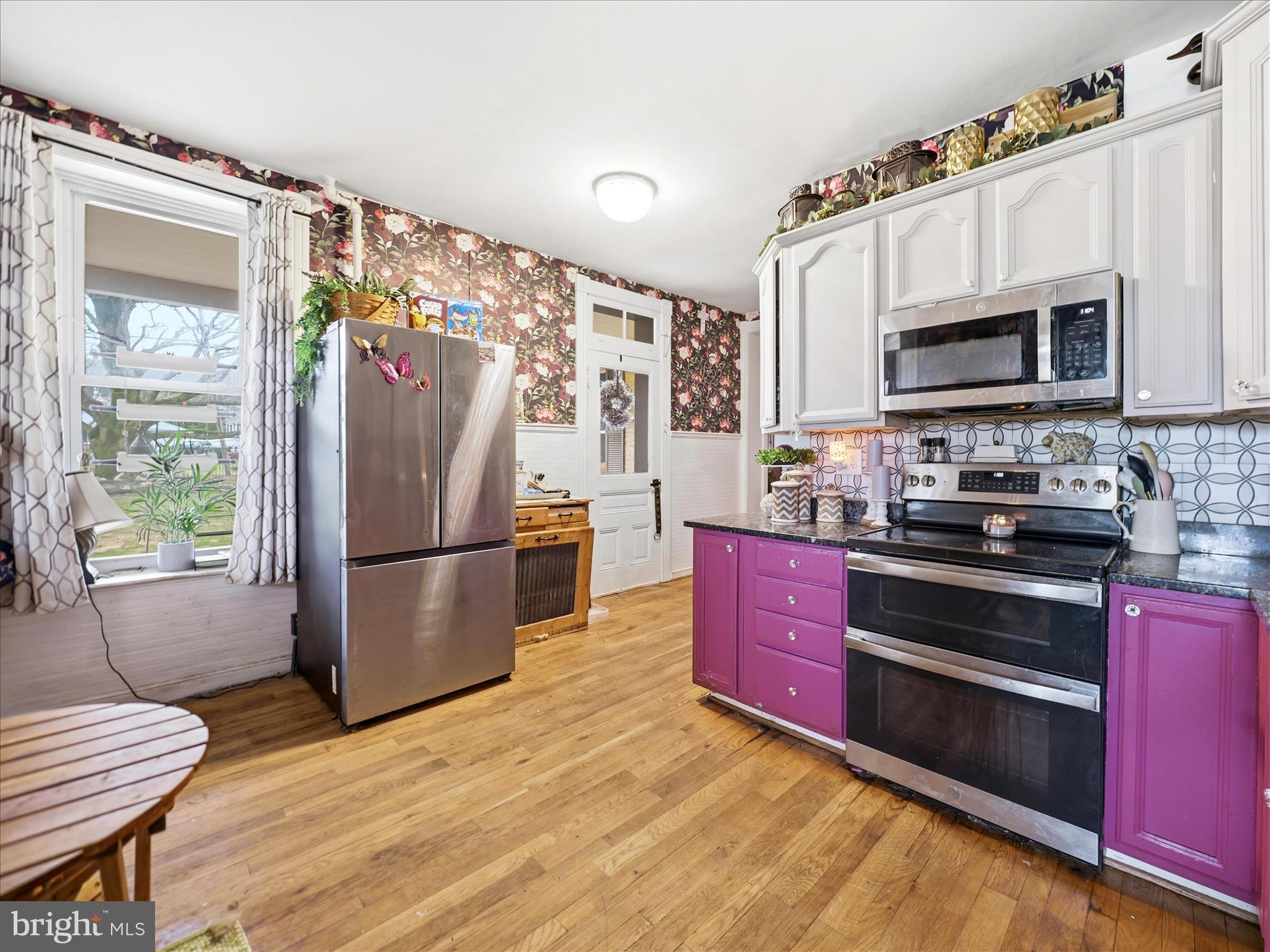 14147 Lower Edgemont Road Waynesboro, PA 17268 - Photo 16 of 45 a kitchen with granite countertop a refrigerator stove top oven and sink