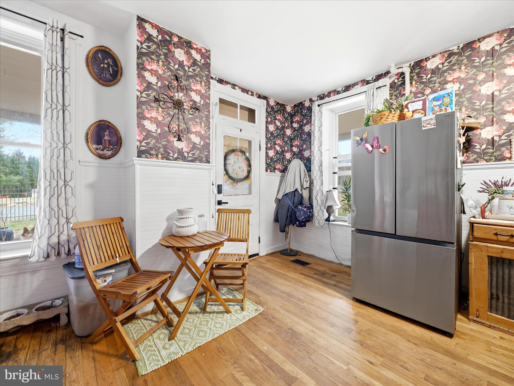 14147 Lower Edgemont Road Waynesboro, PA 17268 - Photo 17 of 45 a kitchen with a refrigerator and a table