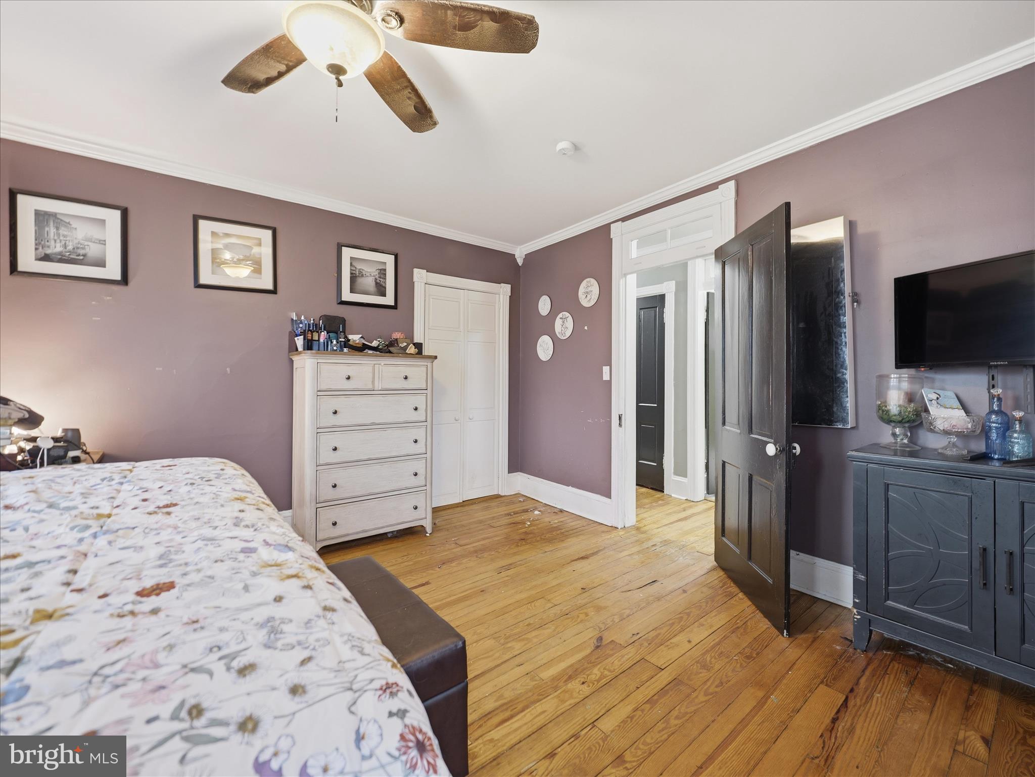 14147 Lower Edgemont Road Waynesboro, PA 17268 - Photo 26 of 45 a bedroom with a bed and a flat tv screen on dresser