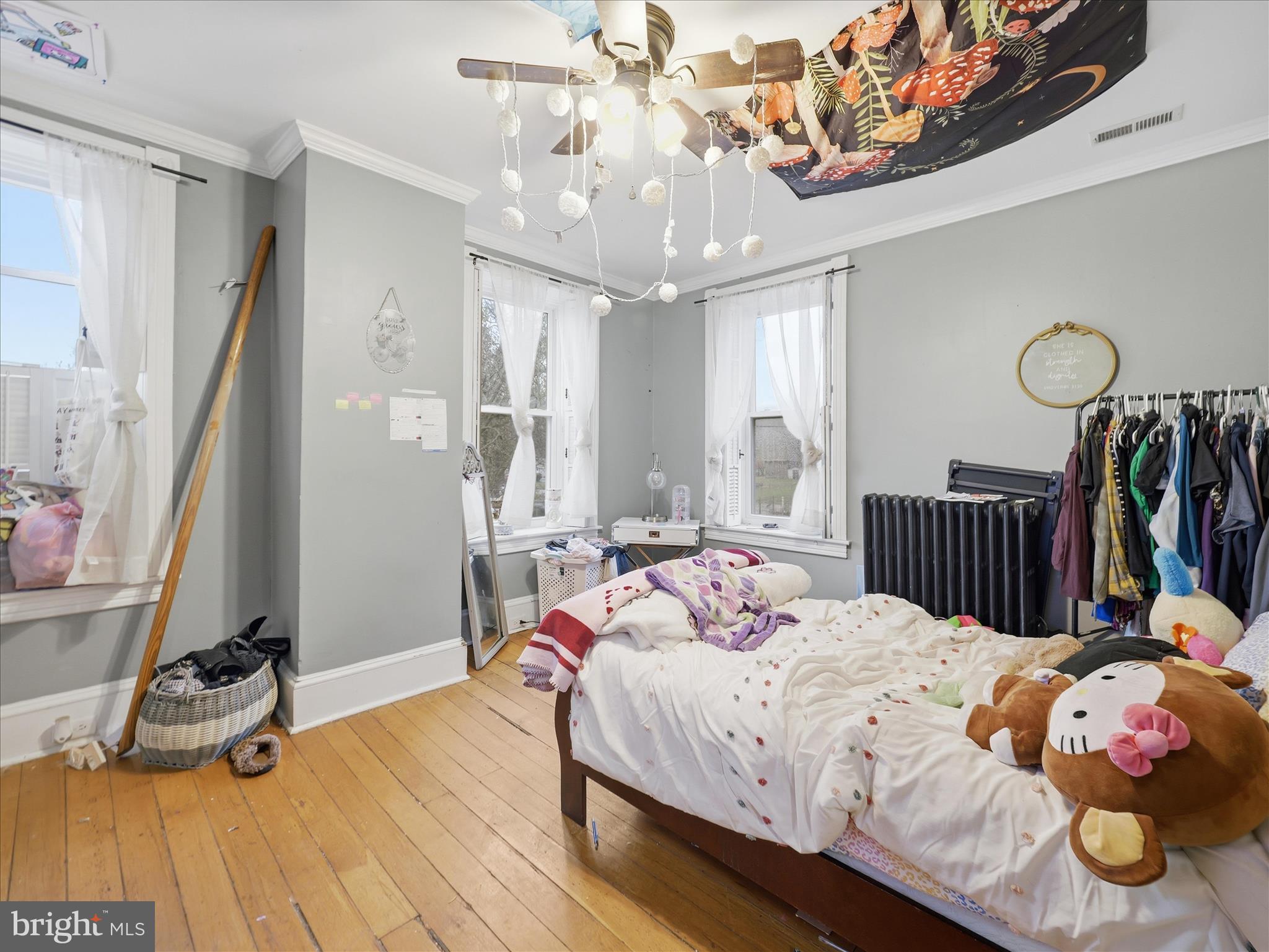 14147 Lower Edgemont Road Waynesboro, PA 17268 - Photo 28 of 45 a bedroom with a bed and wooden floor