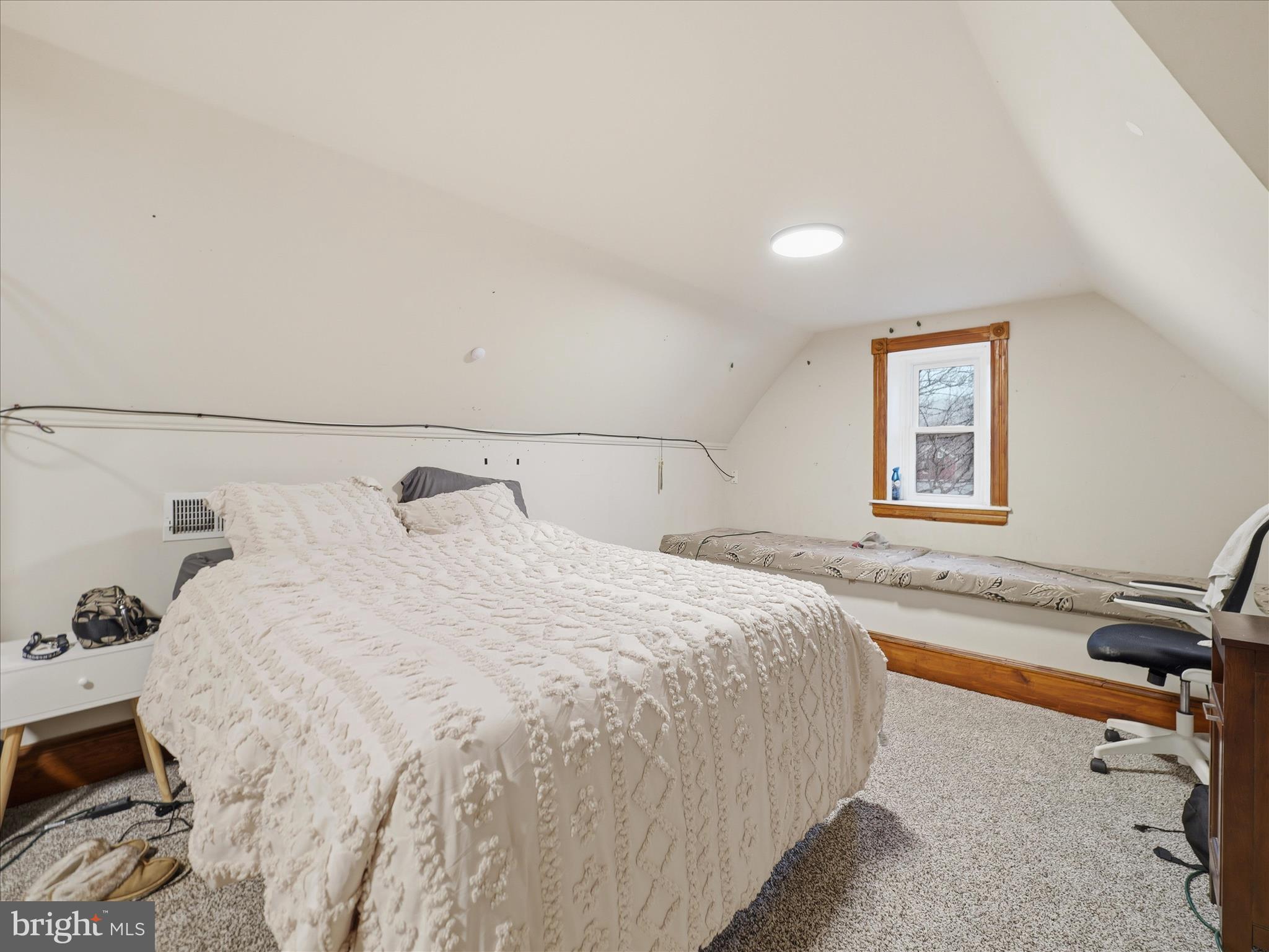 14147 Lower Edgemont Road Waynesboro, PA 17268 - Photo 34 of 45 a bedroom with a bed and wooden floor