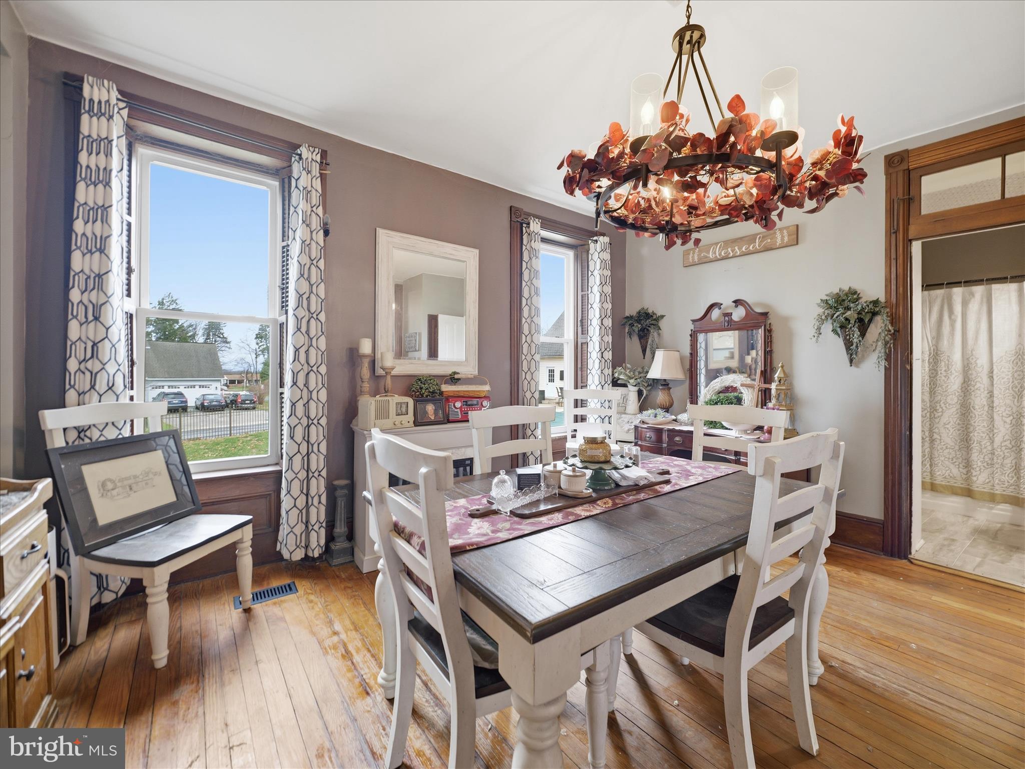 14147 Lower Edgemont Road Waynesboro, PA 17268 - Photo 10 of 45 a view of a dining room with furniture wooden floor and chandelier