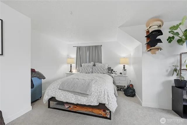 a kitchen with cabinets and refrigerator