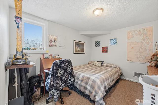 a view of a house with a back yard