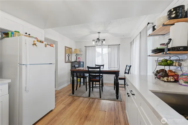 a bedroom with a bed and cabinets