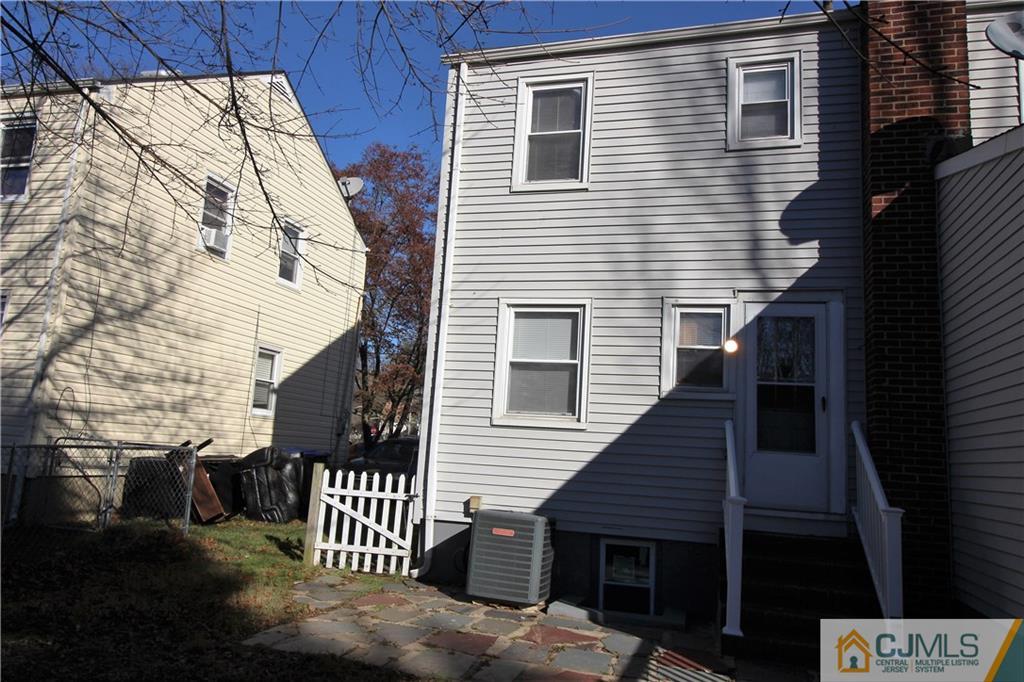 9 MacArthur Drive Edison, NJ 08837 - Photo 22 of 24 a view of a house with a deck