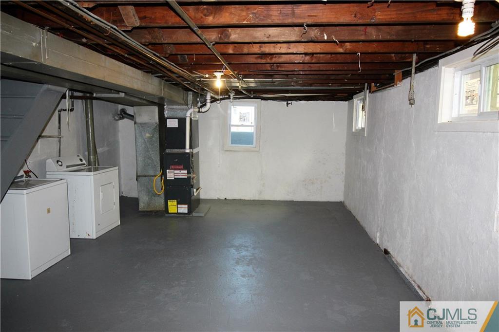 9 MacArthur Drive Edison, NJ 08837 - Photo 23 of 24 a view of storage and utility room with stairs
