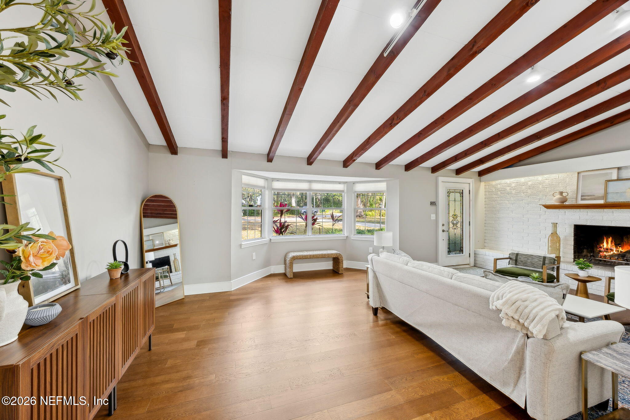 3648 Rubin Road Jacksonville, FL 32257 - Photo 11 of 49 a bedroom with furniture and a fireplace