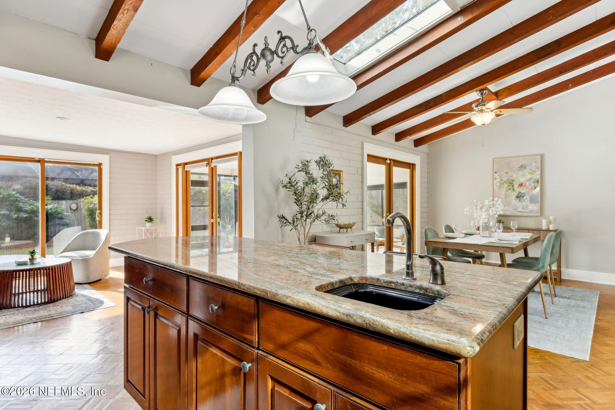 3648 Rubin Road Jacksonville, FL 32257 - Photo 17 of 49 a dining hall with stainless steel appliances granite countertop a stove and cabinets with couches