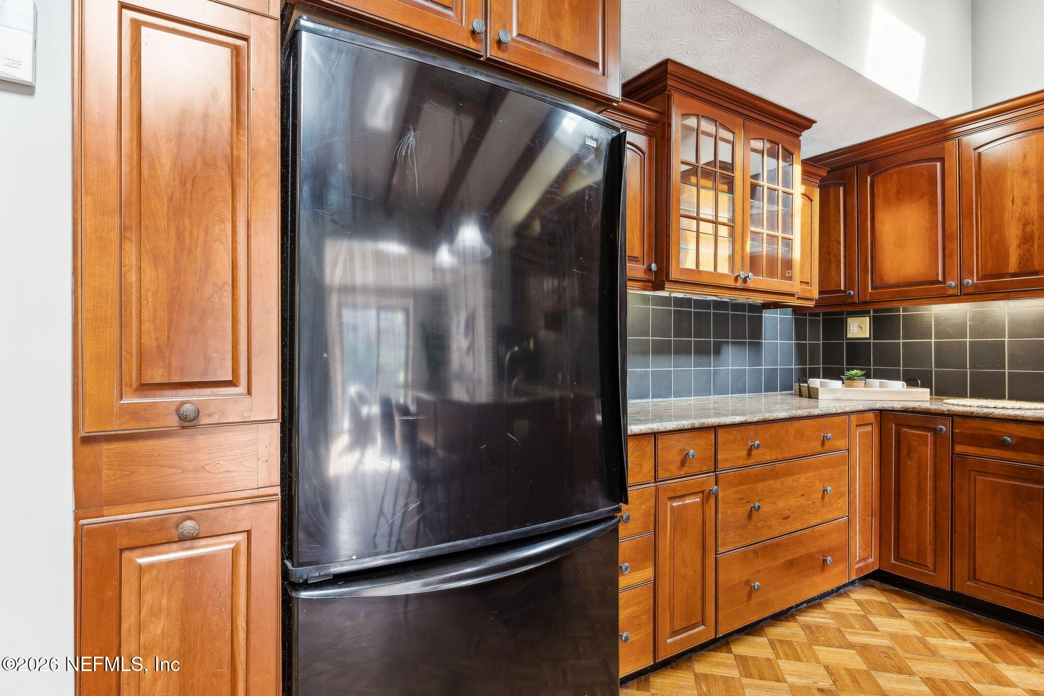 3648 Rubin Road Jacksonville, FL 32257 - Photo 18 of 49 a kitchen with stainless steel appliances granite countertop a refrigerator and a sink