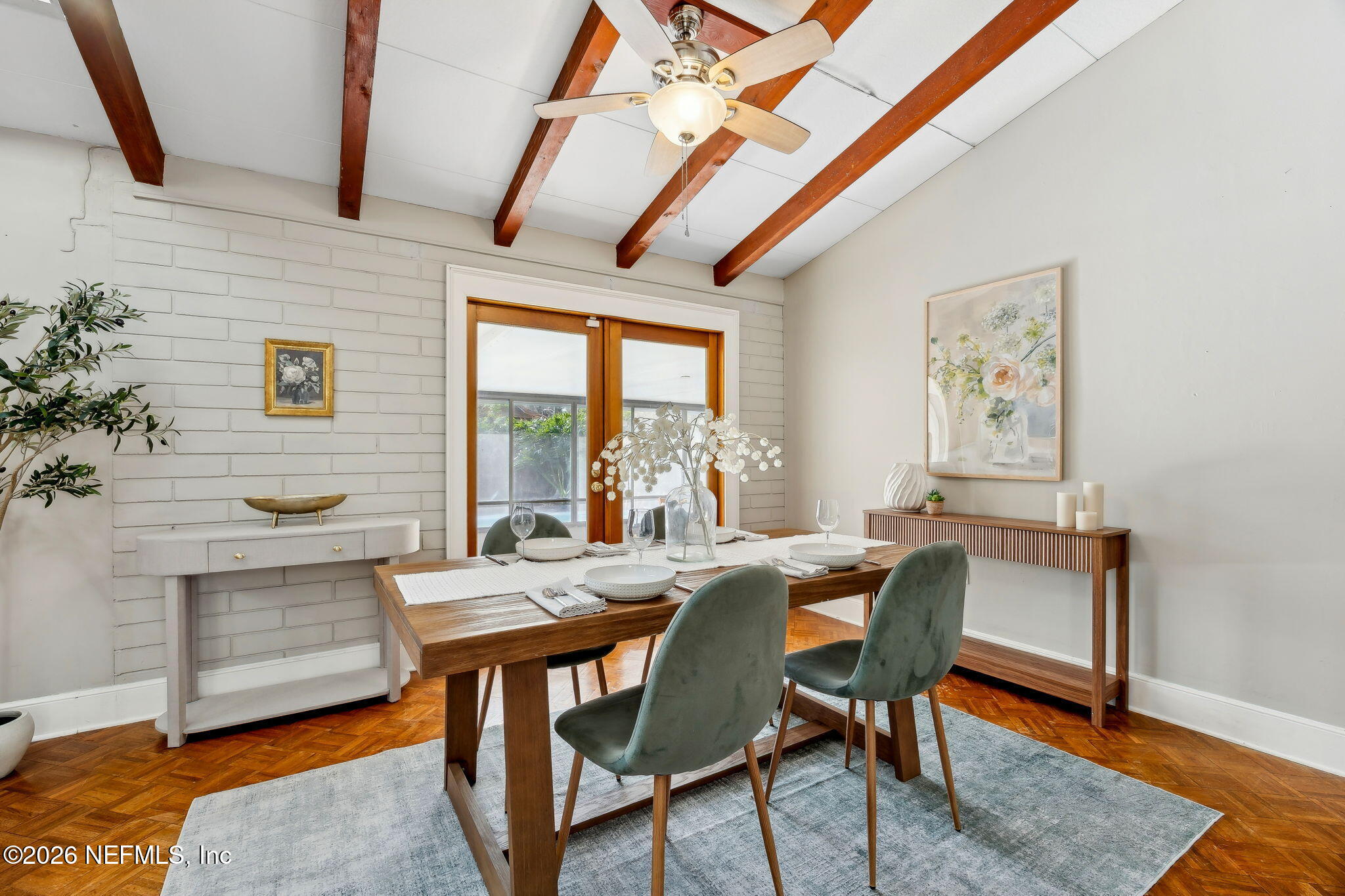 3648 Rubin Road Jacksonville, FL 32257 - Photo 19 of 49 a view of a dining room with furniture window and wooden floor