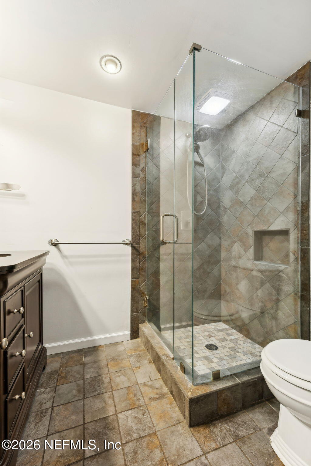 3648 Rubin Road Jacksonville, FL 32257 - Photo 22 of 49 a bathroom with a shower and a toilet