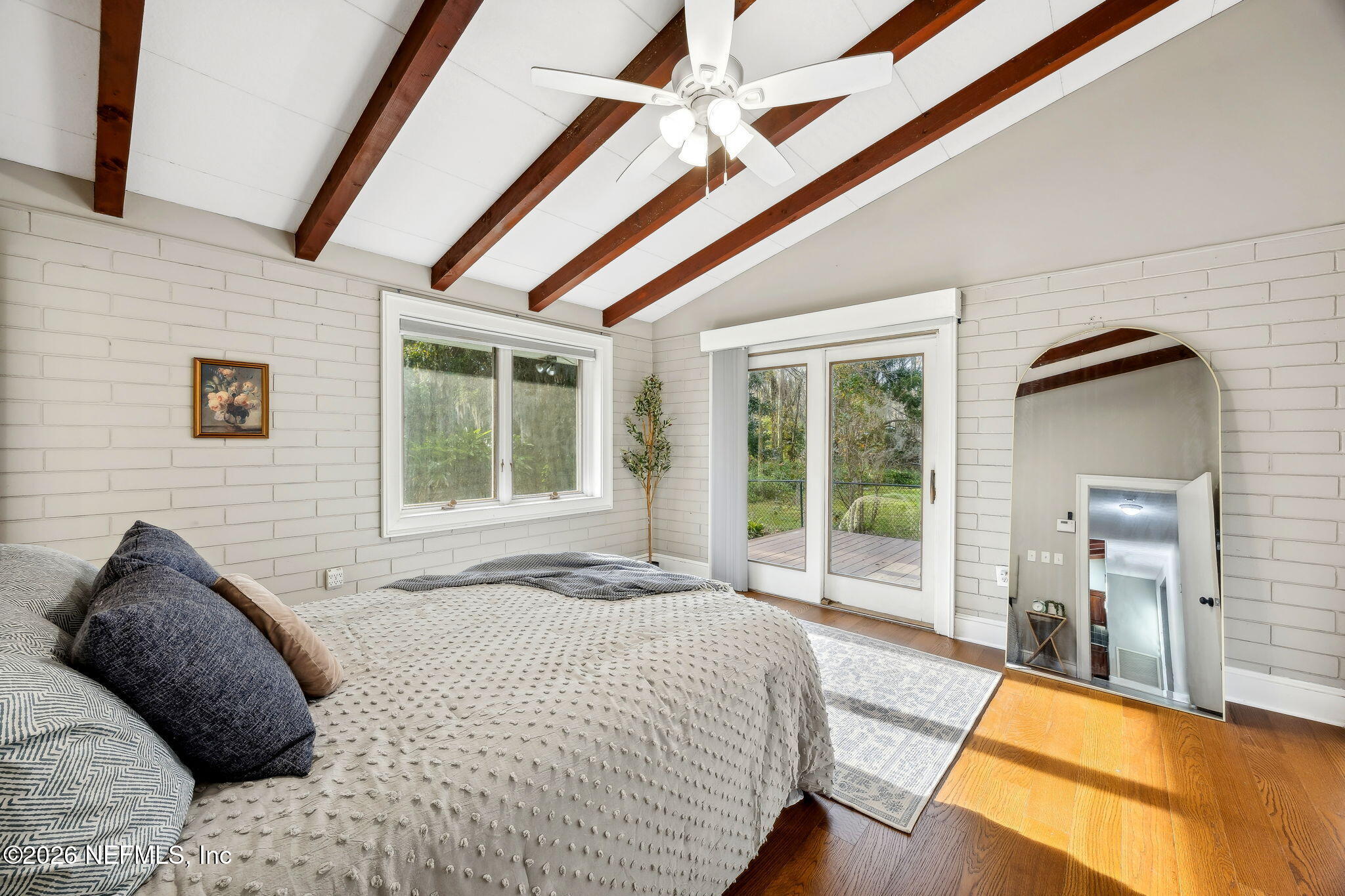 3648 Rubin Road Jacksonville, FL 32257 - Photo 24 of 49 a bed sitting in a spacious bedroom next to a window