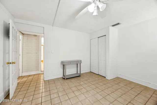 a view of an empty room with window