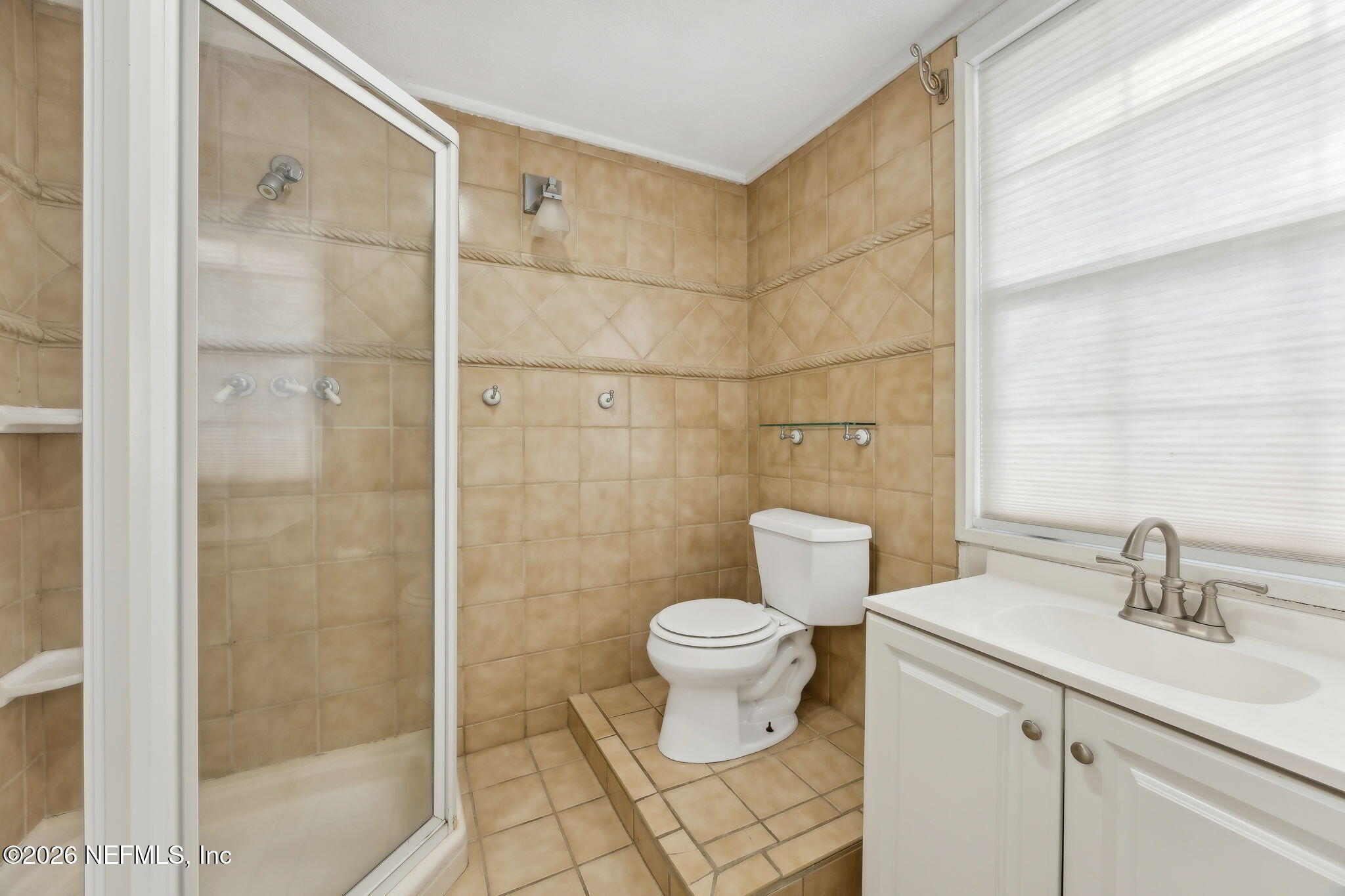 3648 Rubin Road Jacksonville, FL 32257 - Photo 36 of 49 a bathroom with a sink toilet and shower