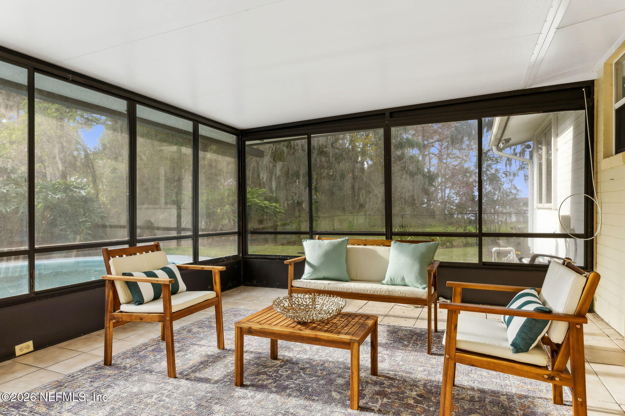 3648 Rubin Road Jacksonville, FL 32257 - Photo 37 of 49 a living room with furniture and a large window