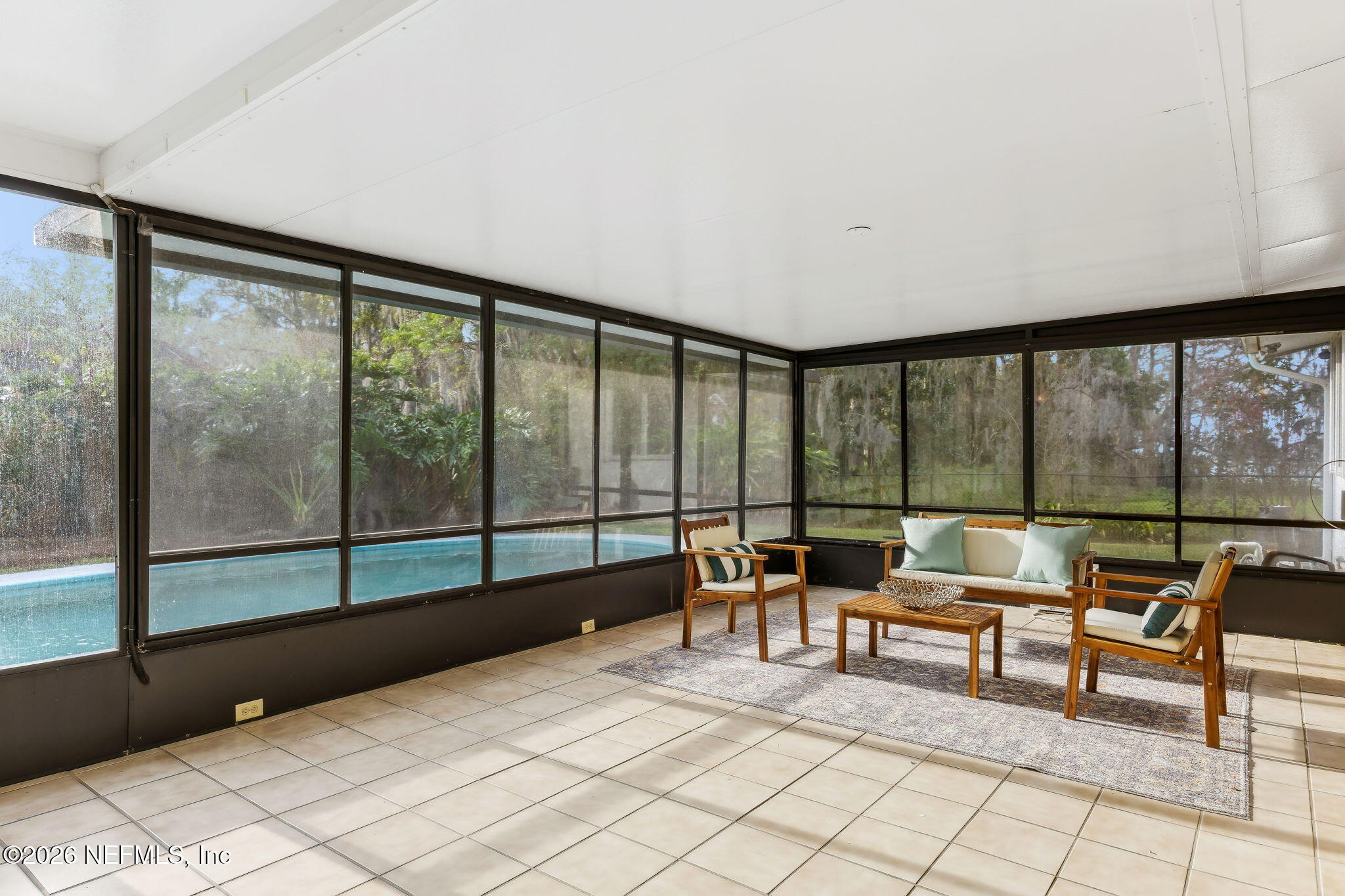 3648 Rubin Road Jacksonville, FL 32257 - Photo 39 of 49 a living room with furniture and a large window