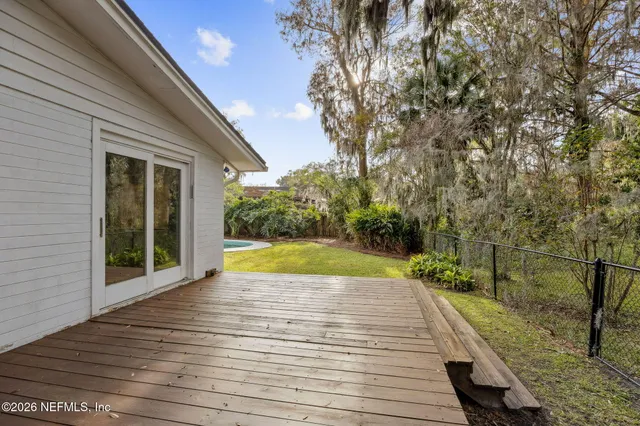 a view of swimming pool with lounge chair