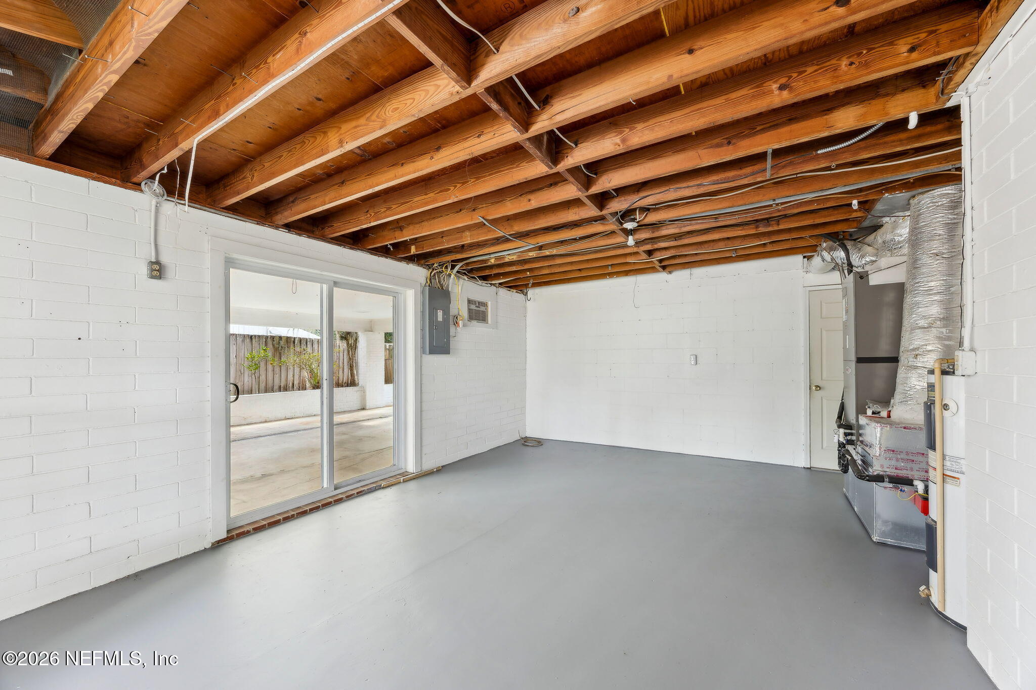 3648 Rubin Road Jacksonville, FL 32257 - Photo 47 of 49 a view of empty room with wooden walls
