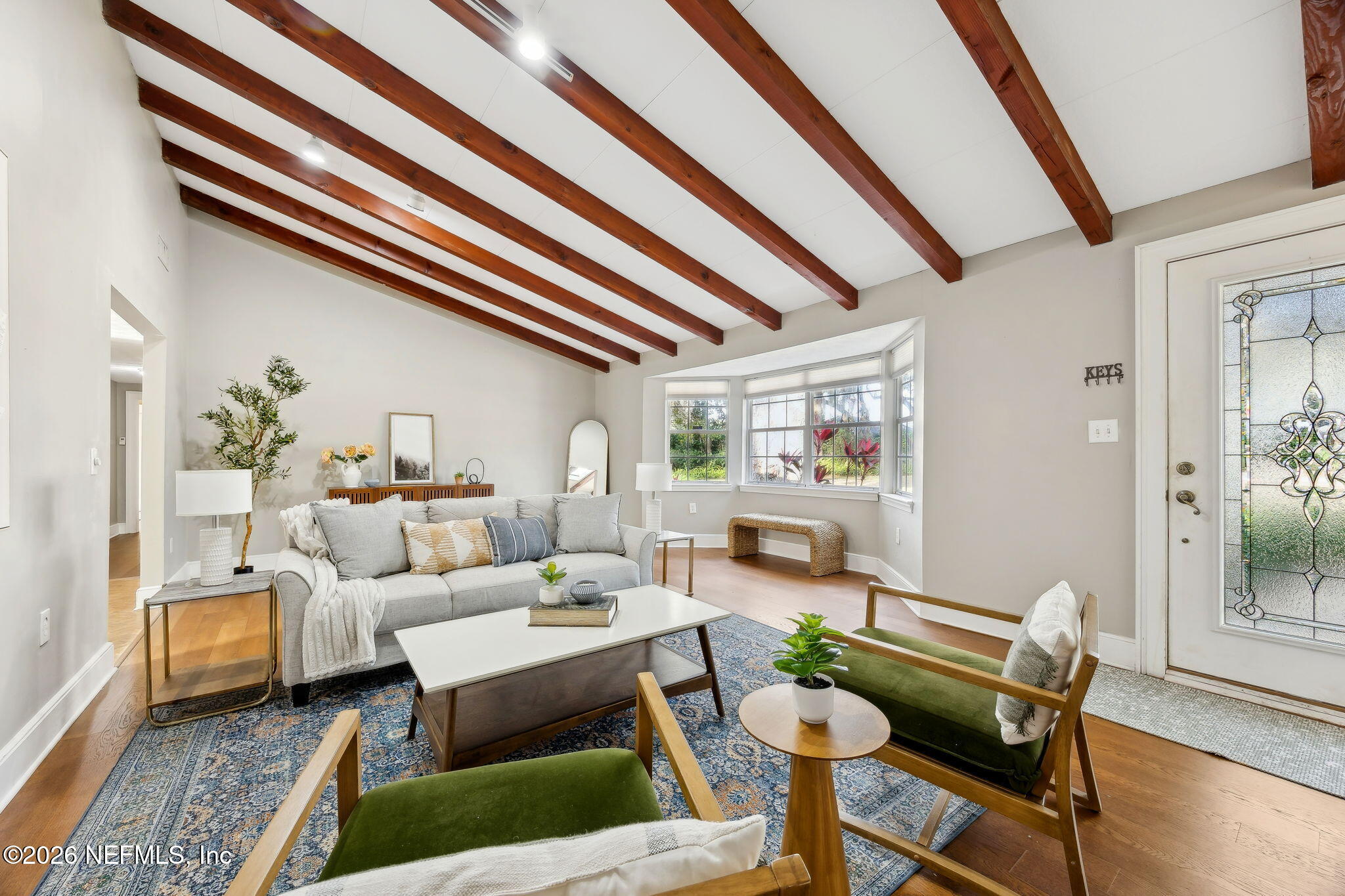 3648 Rubin Road Jacksonville, FL 32257 - Photo 9 of 49 a living room with furniture and a rug