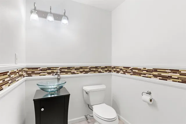 a view of a bathroom with a sink and a toilet