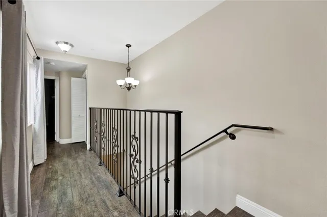 a bedroom with a large bed and a closet