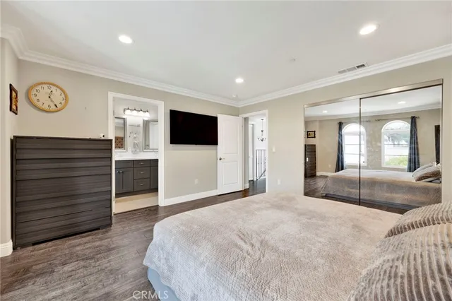a bathroom with a double vanity sink mirror double and shower