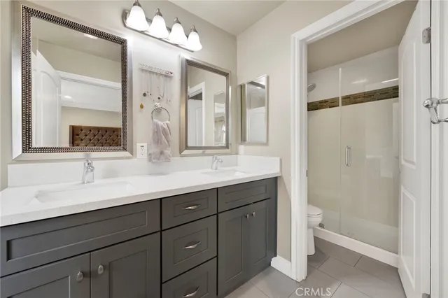 a bathroom with a shower and toilet