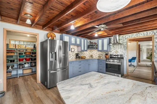 a view of a workspace with furniture and toys