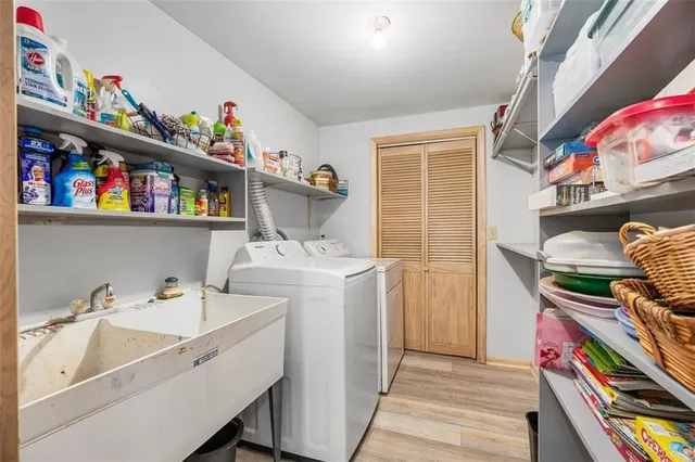 swimming pool view with a seating space