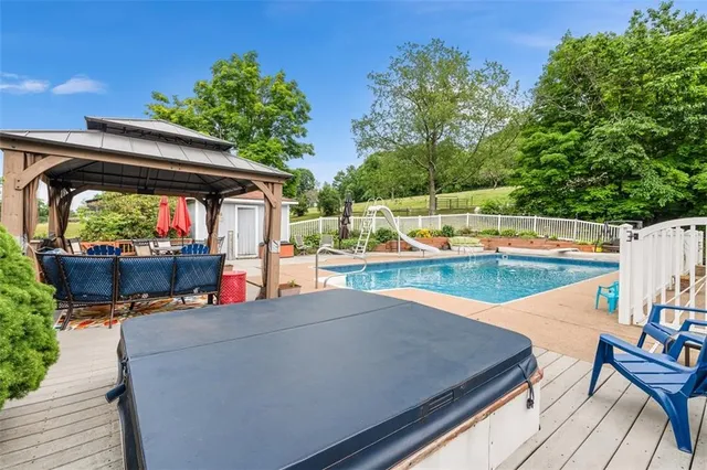 a view of a house with swimming pool