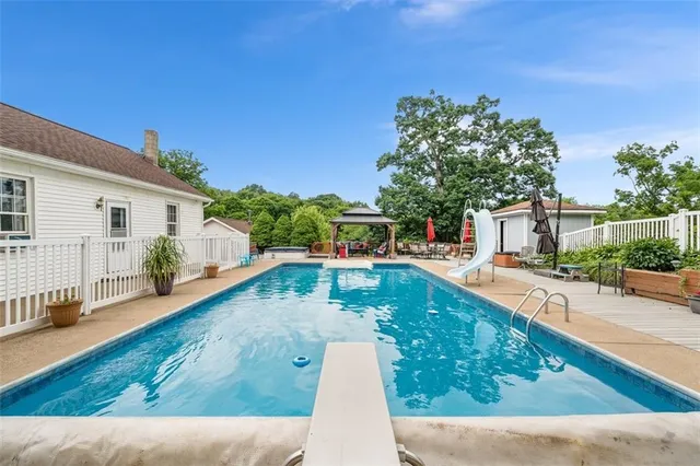 a view of backyard with seating space