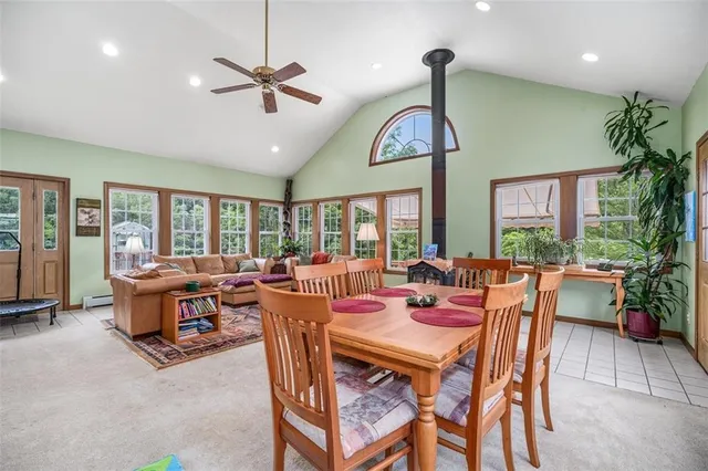 a view of a dining room with furniture window and outside view