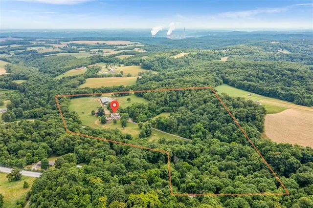 a view of a city with mountains in the background