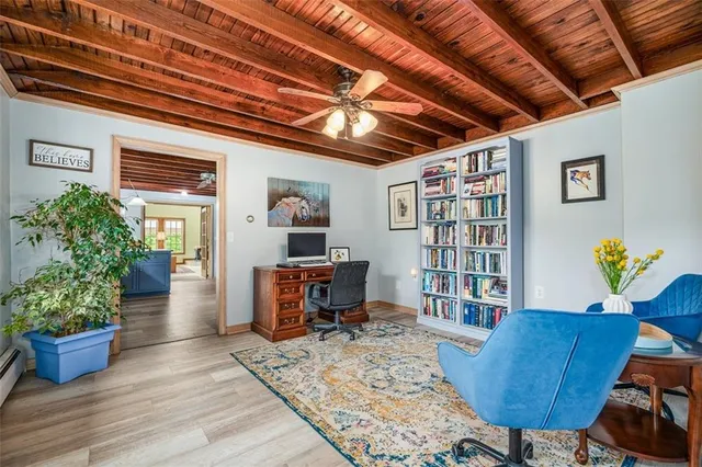 a kitchen with granite countertop a sink and wooden cabinets